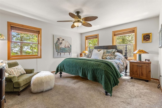 192 Nova Dr, Pine, CO 80470 - bedroom with light colored carpet and a ceiling fan