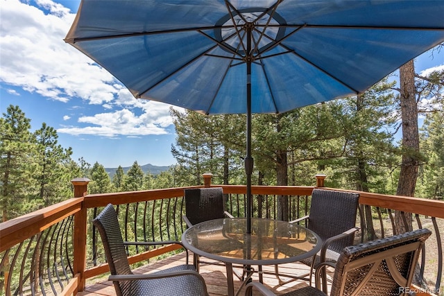 192 Nova Dr, Pine, CO 80470 - wooden terrace with outdoor dining space