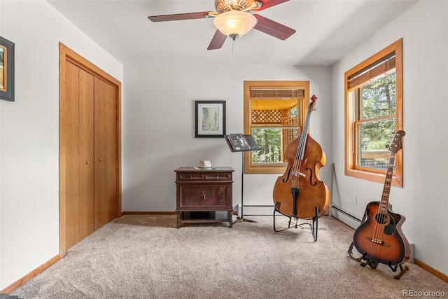 192 Nova Dr, Pine, CO 80470 - sitting room with carpet flooring, a baseboard heating unit, ceiling fan, and baseboard heating