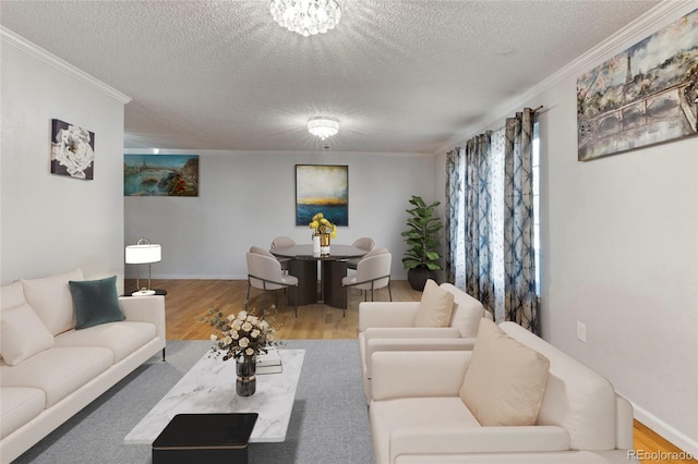 18625 E Kent Dr, Aurora, CO 80013 - living room with a textured ceiling, ornamental molding, and wood finished floors