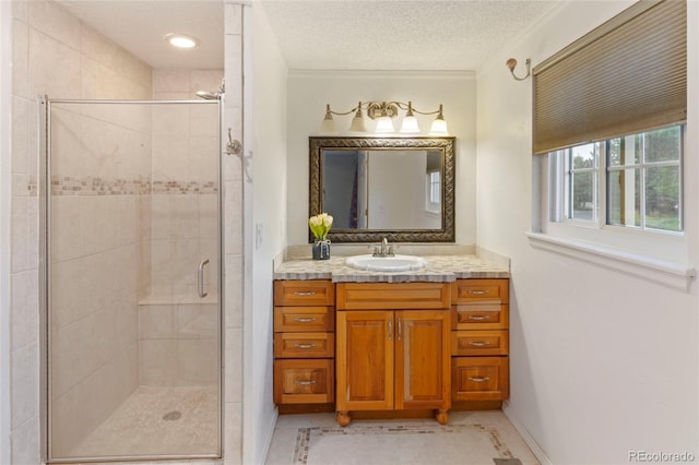 18625 E Kent Dr, Aurora, CO 80013 - full bath with vanity, a stall shower, and a textured ceiling