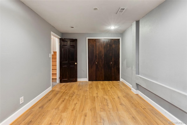 18625 E Kent Dr, Aurora, CO 80013 - unfurnished bedroom featuring light wood-style floors, a closet, and recessed lighting