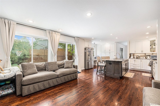 5265 S Cathay Way, Centennial, CO 80015 - living room with dark wood-type flooring, recessed lighting, and beverage cooler