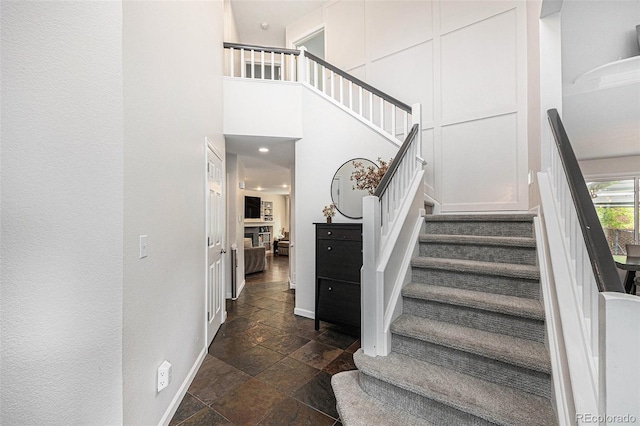 5265 S Cathay Way, Centennial, CO 80015 - stairway with stone tile flooring and baseboards