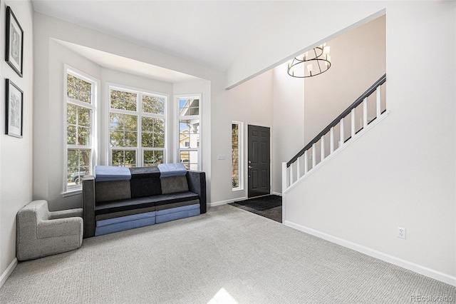 5265 S Cathay Way, Centennial, CO 80015 - foyer featuring carpet floors, a chandelier, and stairs