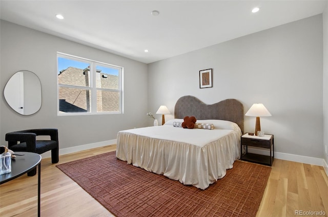 4127 Tejon St, Denver, CO 80211 - bedroom featuring baseboards, light wood-style flooring, and recessed lighting