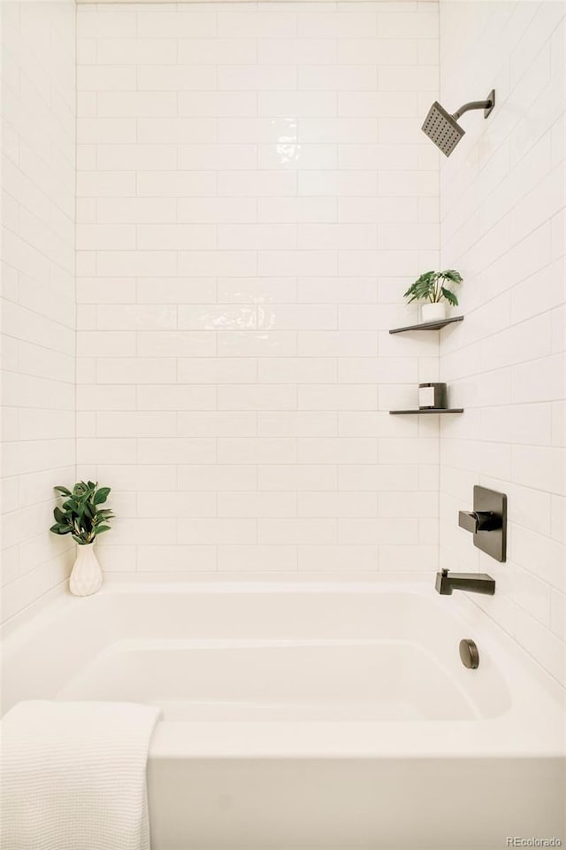 full bathroom featuring tub / shower combination
