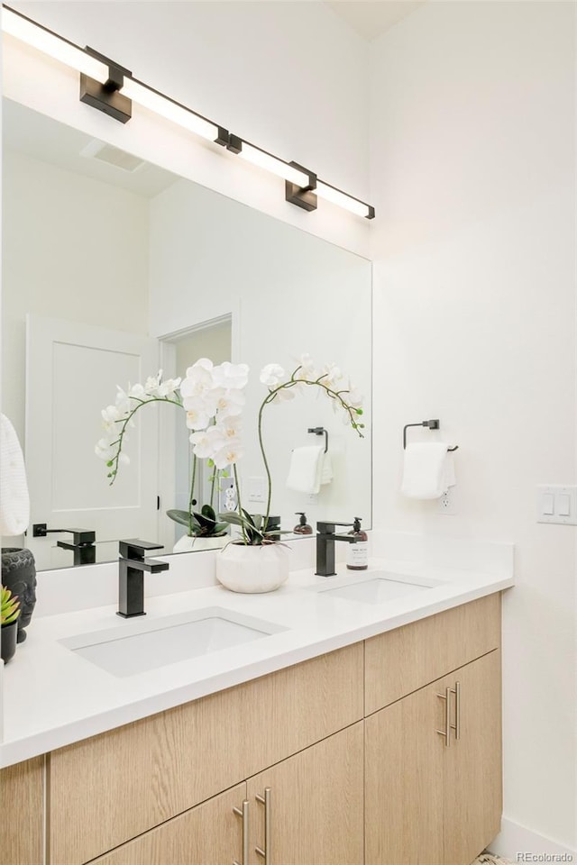 2105 S Galapago St Unit 4, Denver, CO 80223 - full bath featuring double vanity