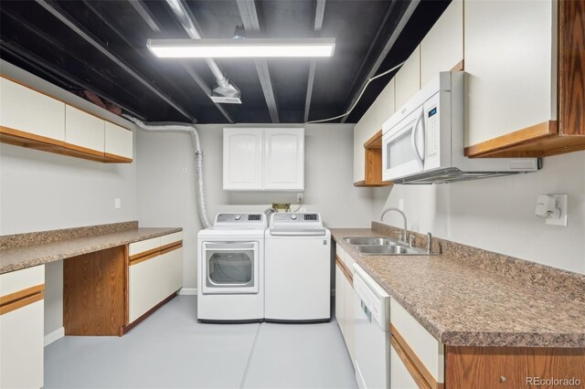 9455 W 81st Ave Unit A, Arvada, CO 80005 - laundry room with a sink and independent washer and dryer