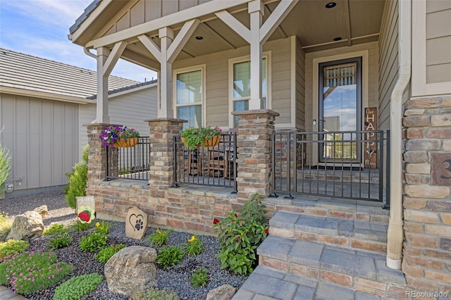 property entrance featuring covered porch