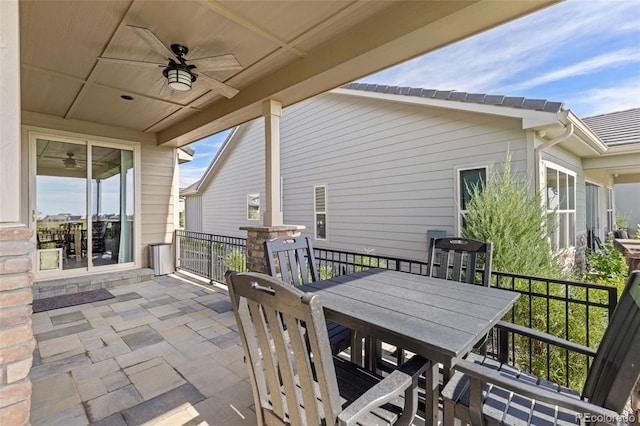 view of patio / terrace with ceiling fan and outdoor dining area