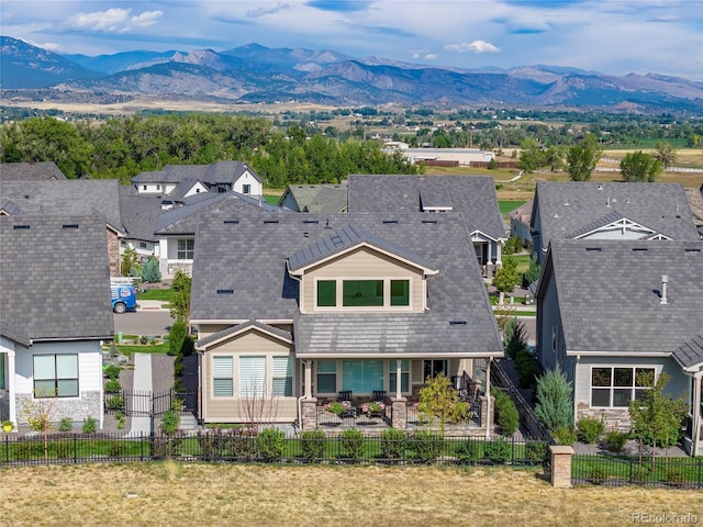 aerial view featuring a residential view and a mountain view