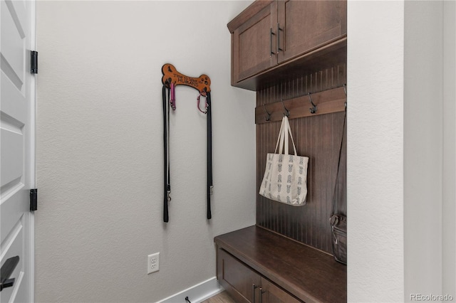 mudroom featuring baseboards