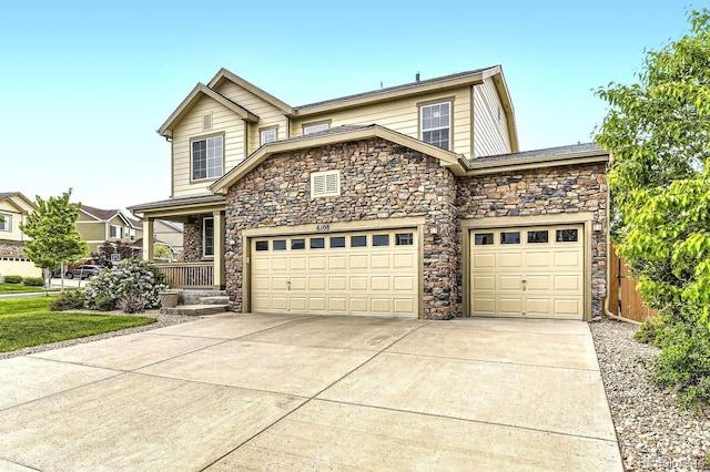 6108 S Harvest Ct, Aurora, CO 80016 - traditional-style house with stone siding, concrete driveway, covered porch, and an attached garage