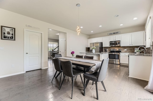 6108 S Harvest Ct, Aurora, CO 80016 - dining area with dark wood-style floors, recessed lighting, and baseboards