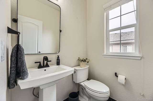 6108 S Harvest Ct, Aurora, CO 80016 - bathroom with toilet and a sink