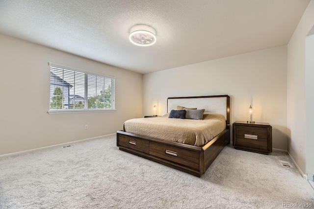 6108 S Harvest Ct, Aurora, CO 80016 - carpeted bedroom featuring baseboards and a textured ceiling