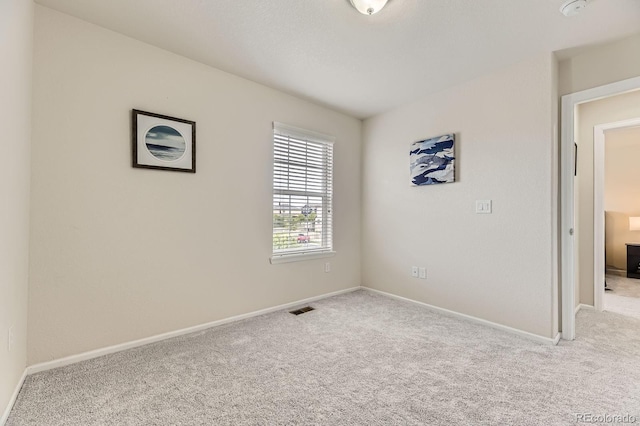 6108 S Harvest Ct, Aurora, CO 80016 - carpeted empty room with baseboards