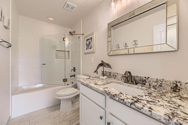 6108 S Harvest Ct, Aurora, CO 80016 - bathroom with vanity, toilet, shower / bath combination, marble look tiles, and recessed lighting