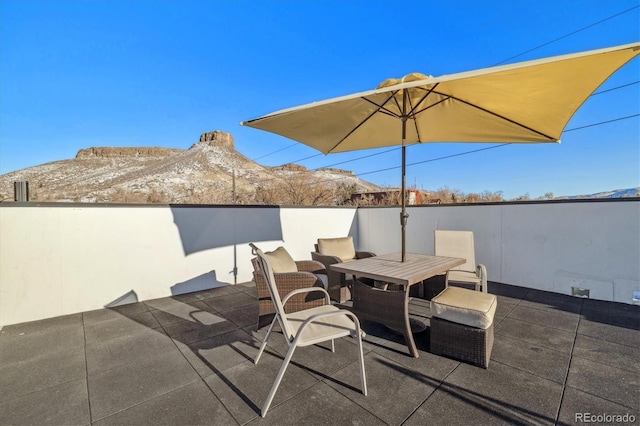 view of patio featuring a mountain view