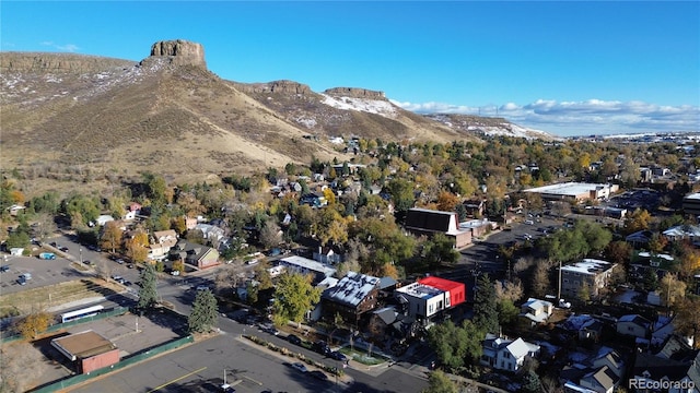 drone / aerial view featuring a mountain view