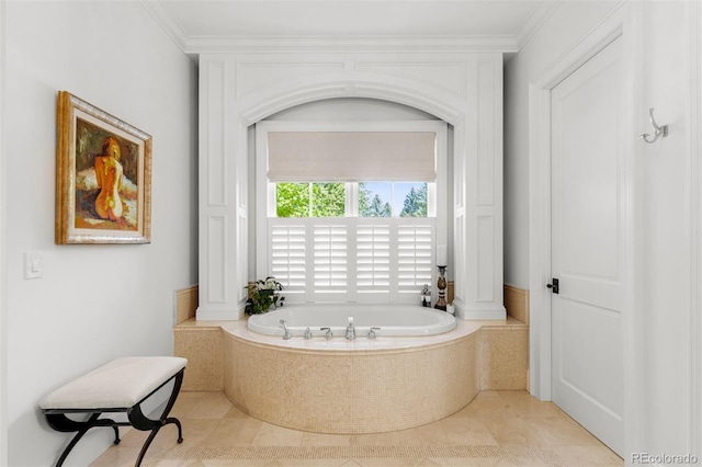 bathroom featuring a garden tub and ornamental molding