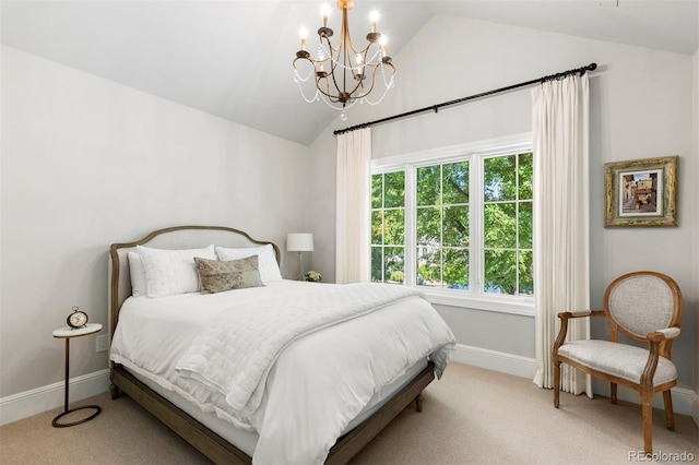 bedroom featuring baseboards, carpet floors, lofted ceiling, and an inviting chandelier