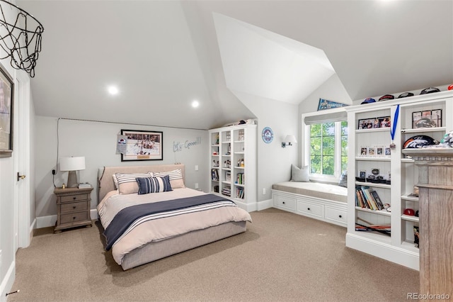 bedroom featuring carpet flooring, baseboards, and vaulted ceiling