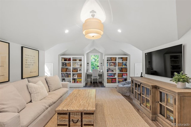 living room with vaulted ceiling, recessed lighting, and wood finished floors