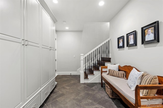 mudroom with recessed lighting and baseboards