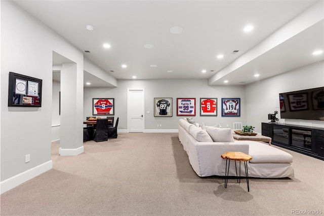 living area featuring recessed lighting, visible vents, baseboards, and carpet flooring