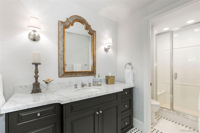 bathroom with tile patterned floors, a shower stall, toilet, and vanity