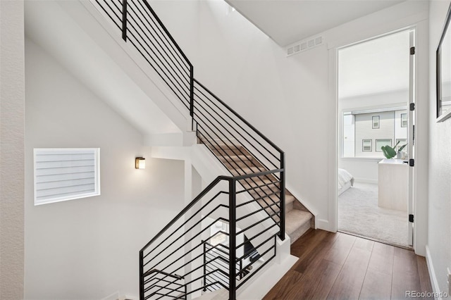 12270 W 57th Ave, Arvada, CO 80002 - stairs featuring wood-type flooring and baseboards
