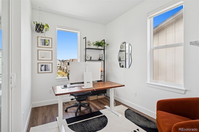 12270 W 57th Ave, Arvada, CO 80002 - office area featuring wood finished floors and baseboards