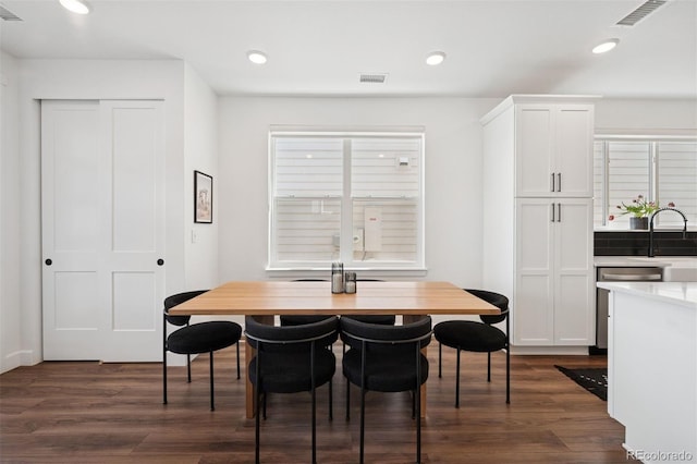 12270 W 57th Ave, Arvada, CO 80002 - dining space with dark wood-type flooring and recessed lighting