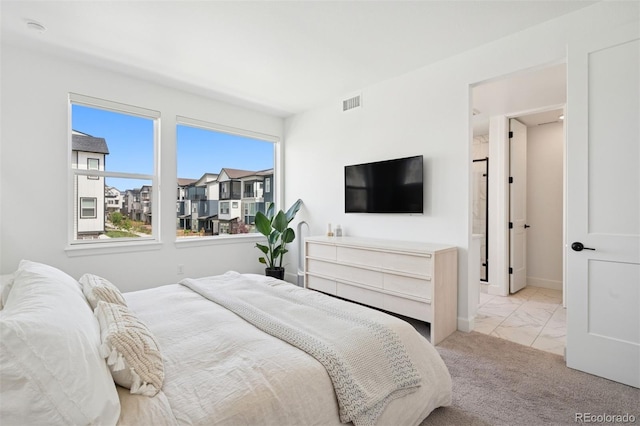 12270 W 57th Ave, Arvada, CO 80002 - bedroom featuring marble finish floors and baseboards