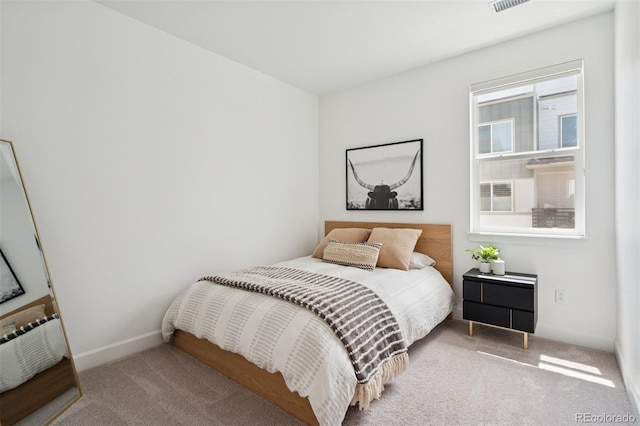 12270 W 57th Ave, Arvada, CO 80002 - carpeted bedroom featuring baseboards