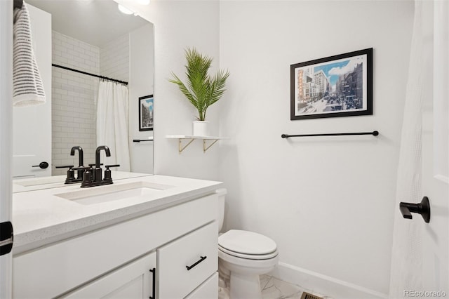 12270 W 57th Ave, Arvada, CO 80002 - bathroom with marble look tile flooring, vanity, baseboards, toilet, and a shower with shower curtain