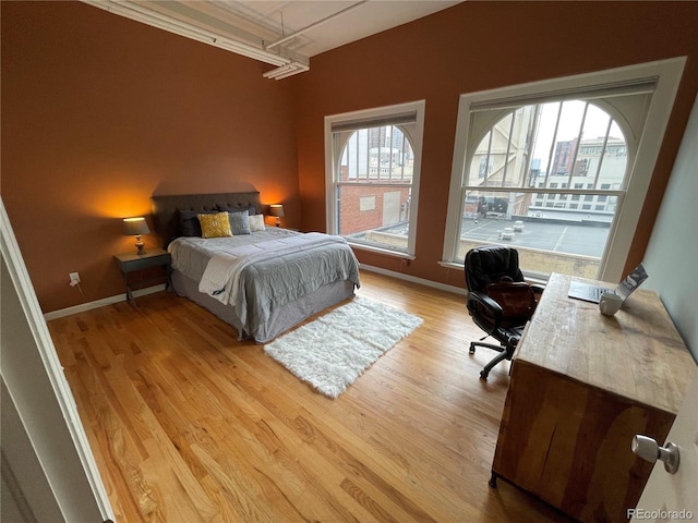 bedroom with light hardwood / wood-style floors