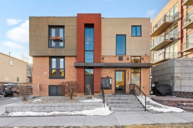 view of front of house with brick siding