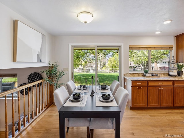 6490 S Pontiac Ct, Centennial, CO 80111 - dining area with a healthy amount of sunlight, recessed lighting, and light wood-style flooring