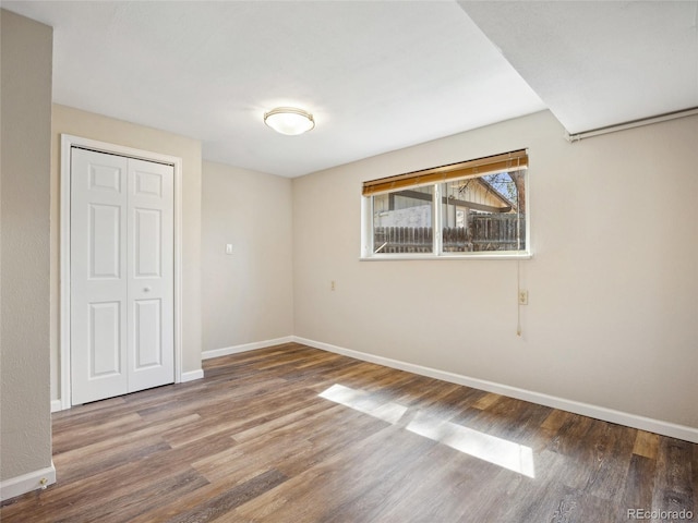 6490 S Pontiac Ct, Centennial, CO 80111 - empty room featuring baseboards and wood finished floors