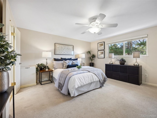 6490 S Pontiac Ct, Centennial, CO 80111 - bedroom featuring baseboards, ceiling fan, and light carpet