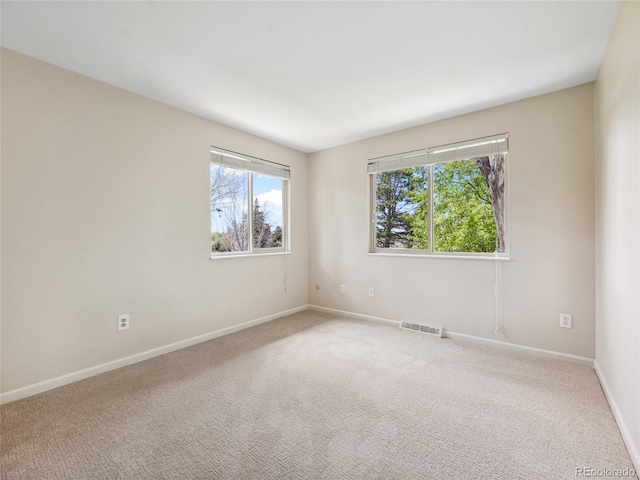 6490 S Pontiac Ct, Centennial, CO 80111 - carpeted spare room with baseboards and visible vents