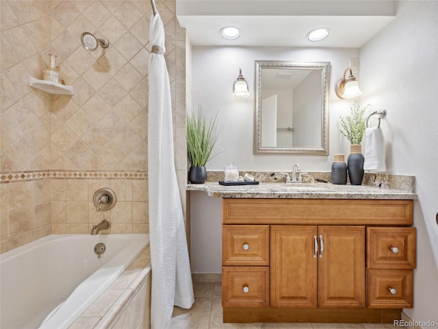 6490 S Pontiac Ct, Centennial, CO 80111 - full bath with vanity, tile patterned floors, baseboards, and tiled shower / bath