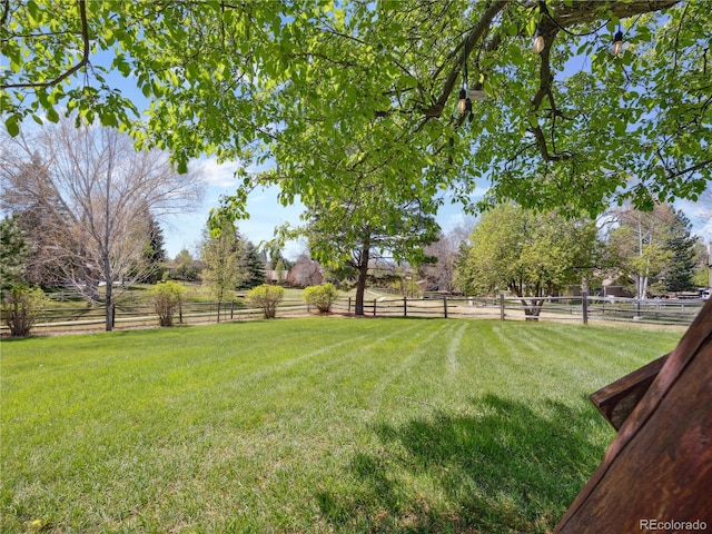6490 S Pontiac Ct, Centennial, CO 80111 - view of yard featuring a rural view and fence