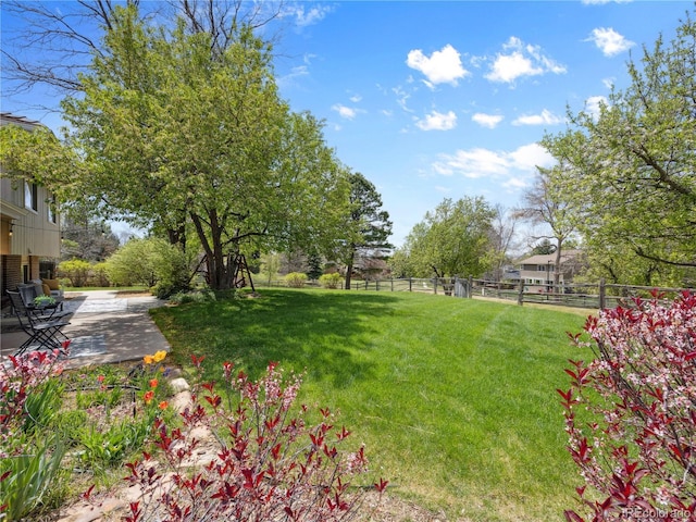6490 S Pontiac Ct, Centennial, CO 80111 - view of yard featuring fence and a patio area