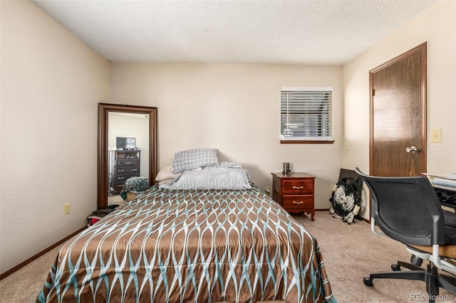 carpeted bedroom with a textured ceiling