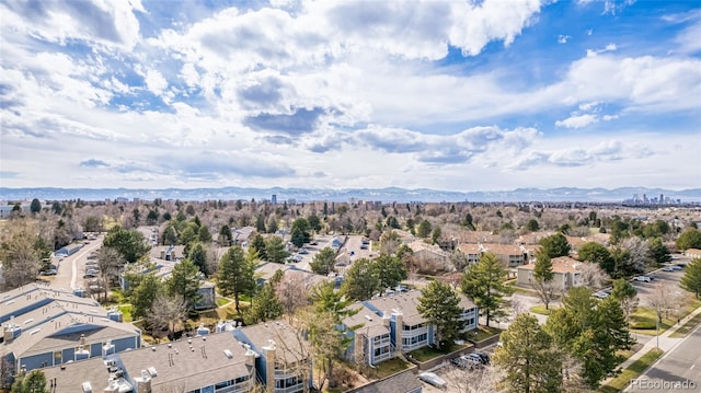 birds eye view of property featuring a mountain view