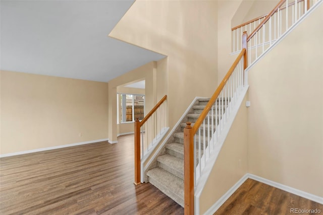 3371 Bexley Dr, Colorado Springs, CO 80922 - staircase featuring wood finished floors and baseboards